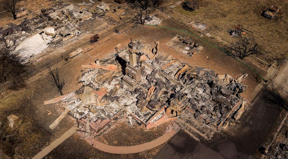 PHOTO: In this Sept. 24, 2021, file photo a burned residence is shown in Greenville, Calif. The Dixie fire has burned almost 1 million acres and remains at 94% containment after burning through 5 counties and more than 1,000 homes.
