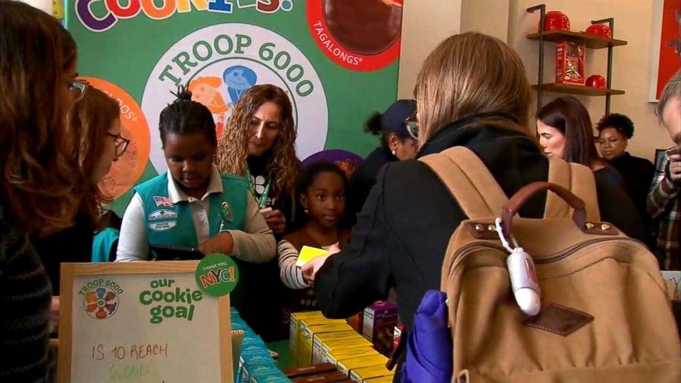 PHOTO: Members of Girl Scout Troop 6000, New York's first homeless shelter-based troop, hold their first cookie sale in Union Square, Manhattan in April 2018. 