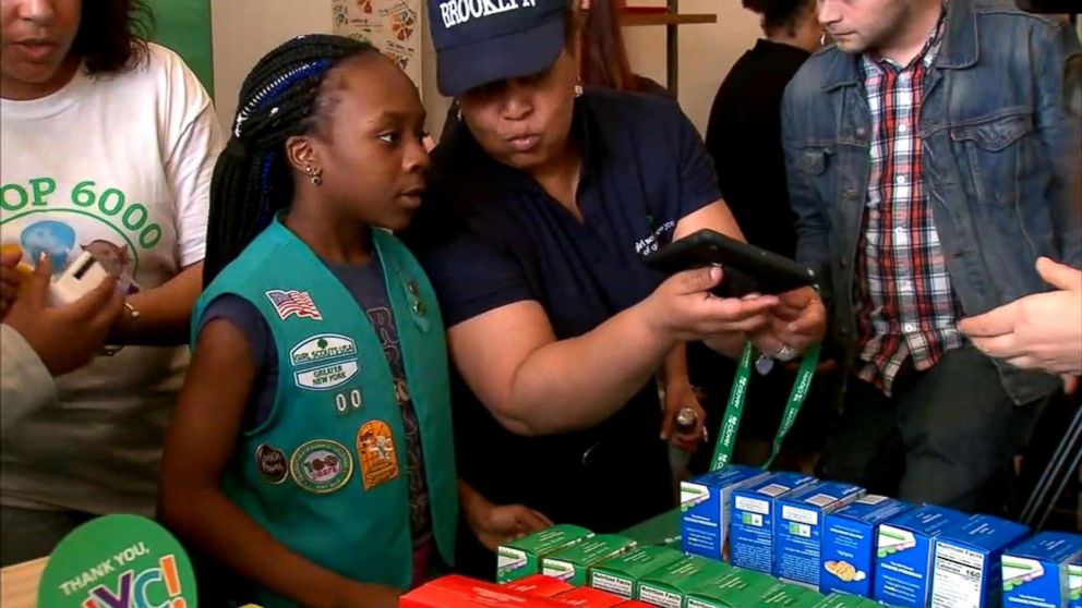 PHOTO: A member of Girl Scout Troop 6000, New York's first homeless shelter-based troop, participates in the troop's first cookie sale in Union Square, Manhattan in April 2018.