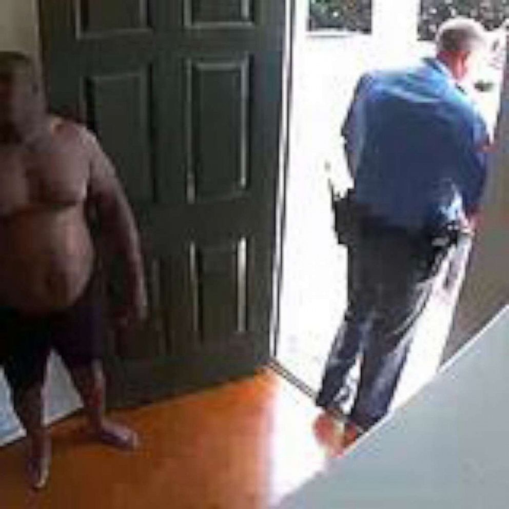 PHOTO: Security video shows Raleigh, North Carolina, homeowner Kazeem Oyeneyin, being returned to his home in just his underwear after he was handcuffed and placed in a police car when officers responded to a false burglary alarm on Aug. 17, 2019.