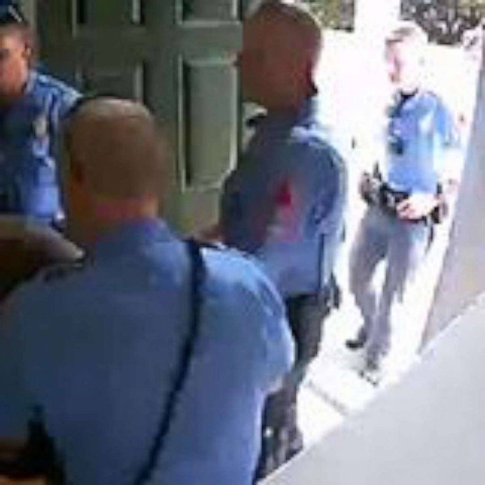 PHOTO: Security video shows police handcuffing Raleigh, North Carolina, homeowner Kazeem Oyeneyin and removing him from his house after answering a false burglary alarm on Aug. 17, 2019.