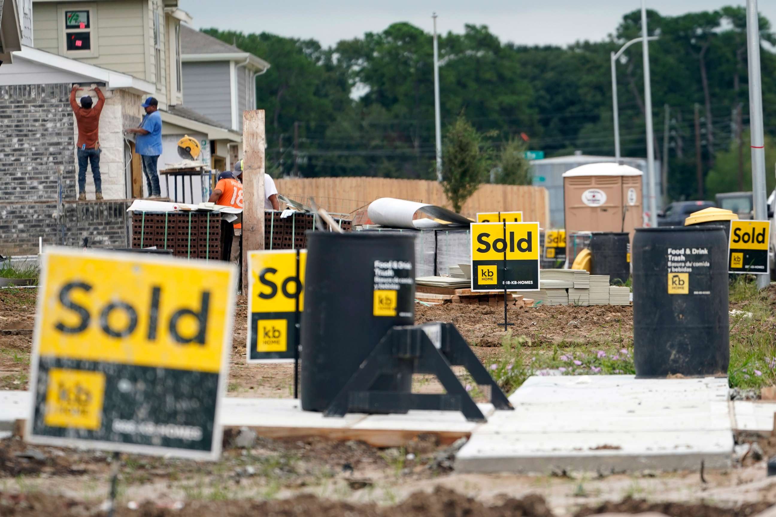 PHOTO: Construction workers build already sold new homes, Sept. 24, 2020, in Houston.