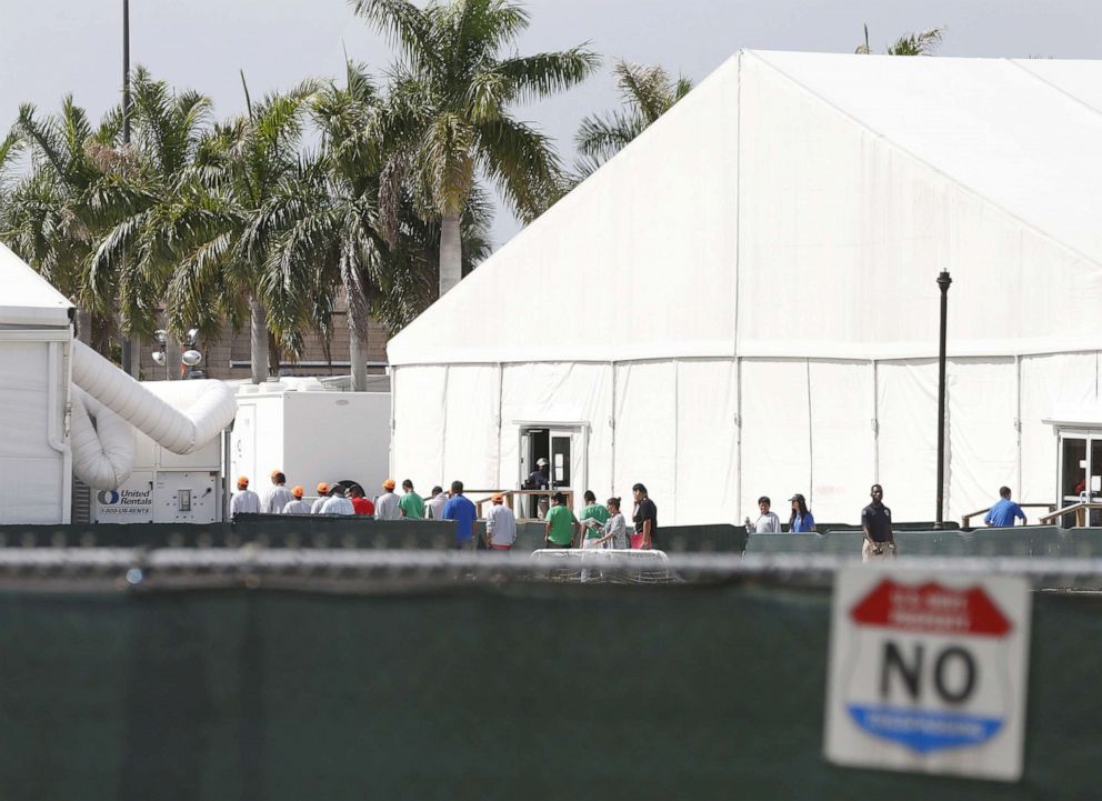 PHOTO: Migrant children who have been separated from their families can be seen in tents at a detention center in Homestead, Florida, June 27, 2019.
