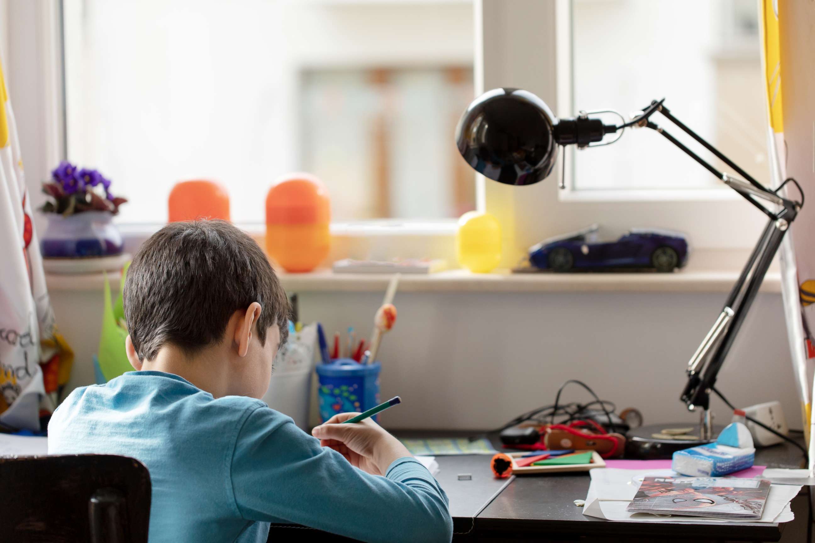 PHOTO: A young boy works on his homework in this undated stock photo.