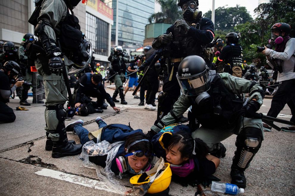 PHOTO: Riot police detain demonstrators during a protest in the Admiralty district of Hong Kong, China, on Sunday, Sept. 29, 2019.