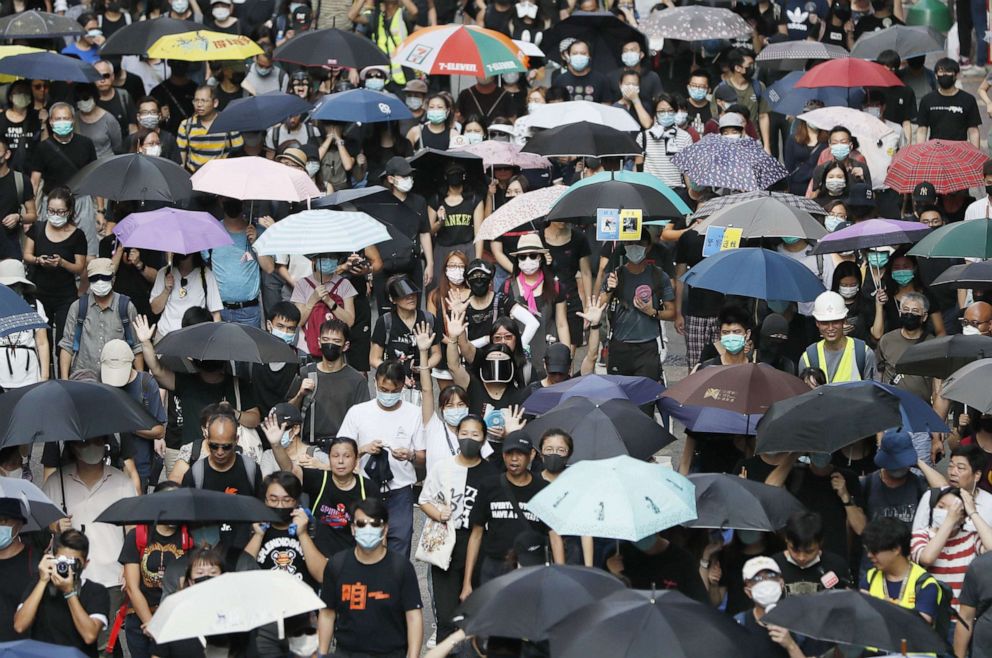 PHOTO: People stage a rally in Hong Kong on Oct. 5, 2019, wearing masks in protest at the Hong Kong government's enactment of an emergency law banning people from wearing face masks during demonstrations.