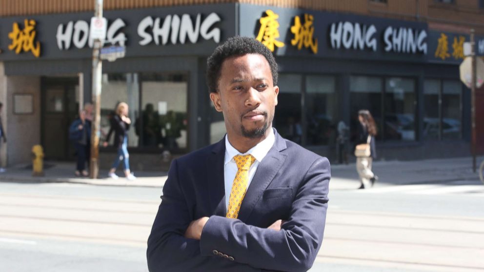 Emile Wickham stands in front of the Hong Shing Chinese restaurant in Toronto on April 30, 2018.
