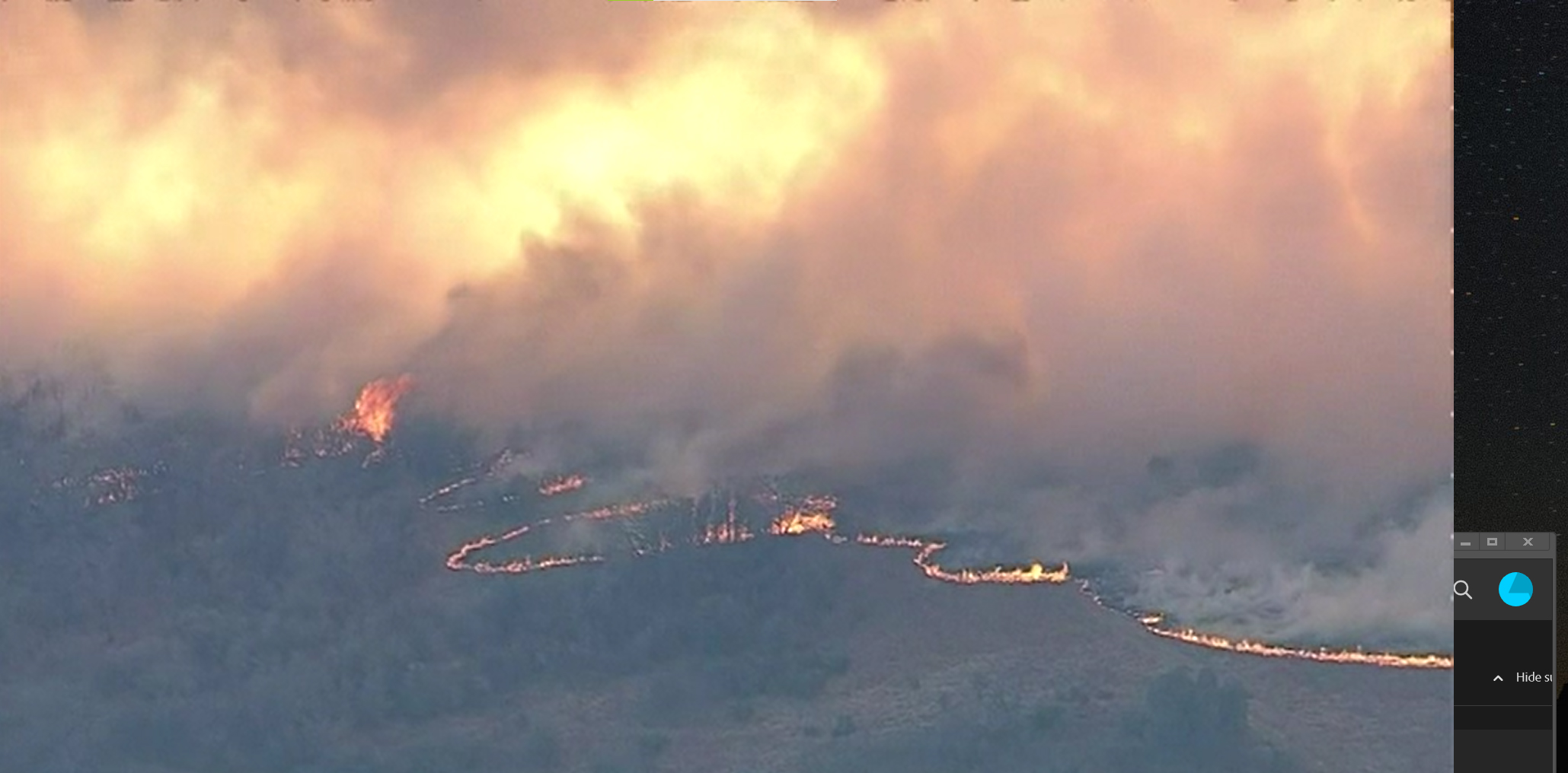 PHOTO: In this screen grab from a video, a wildfire burns in Hood County, Texas, on March 20, 2022.