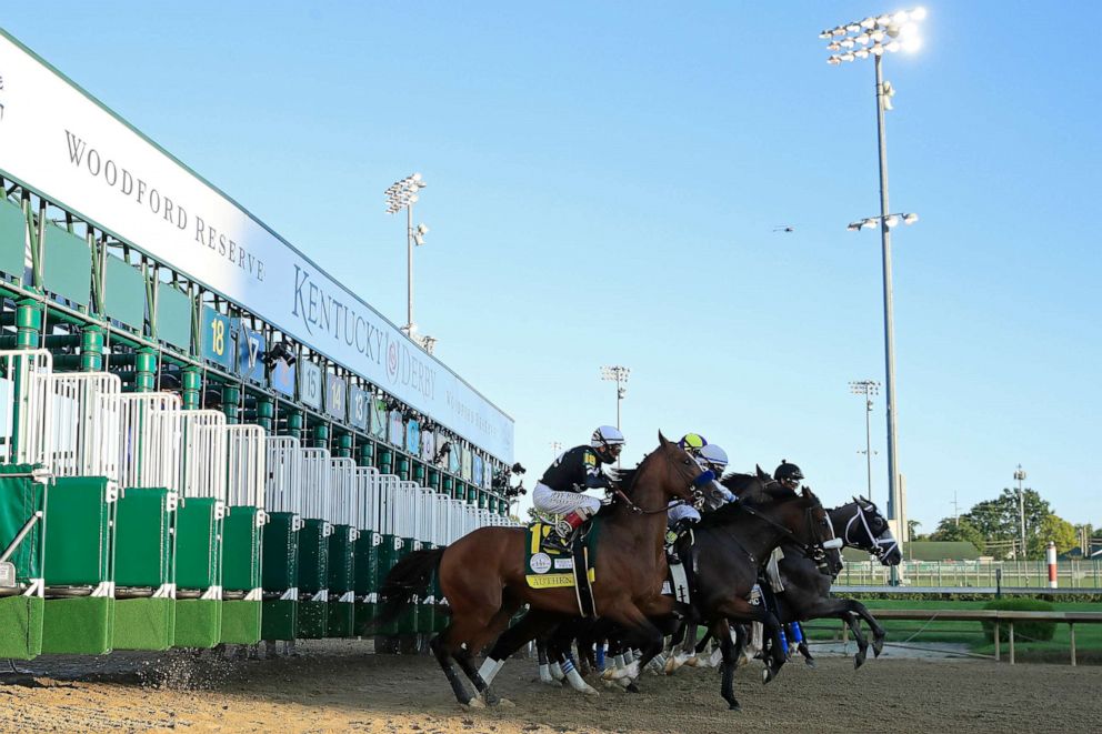 PHOTO: Authentic #18, ridden by jockey John Velazquez and the field break from the starting gate during the 146th running of the Kentucky Derby at Churchill Downs in Louisville, Ky., Sept. 05, 2020.