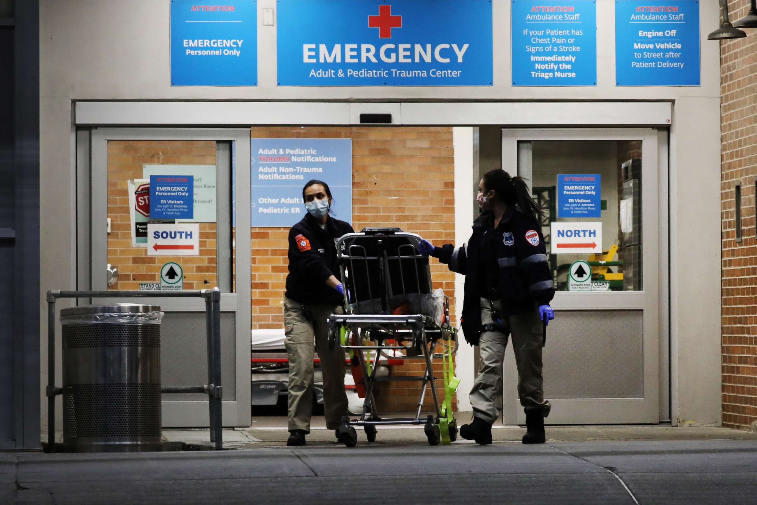 PHOTO: Medical workers walk outside a special coronavirus area at Maimonides Medical Center on May 26, 2020 in New York City.