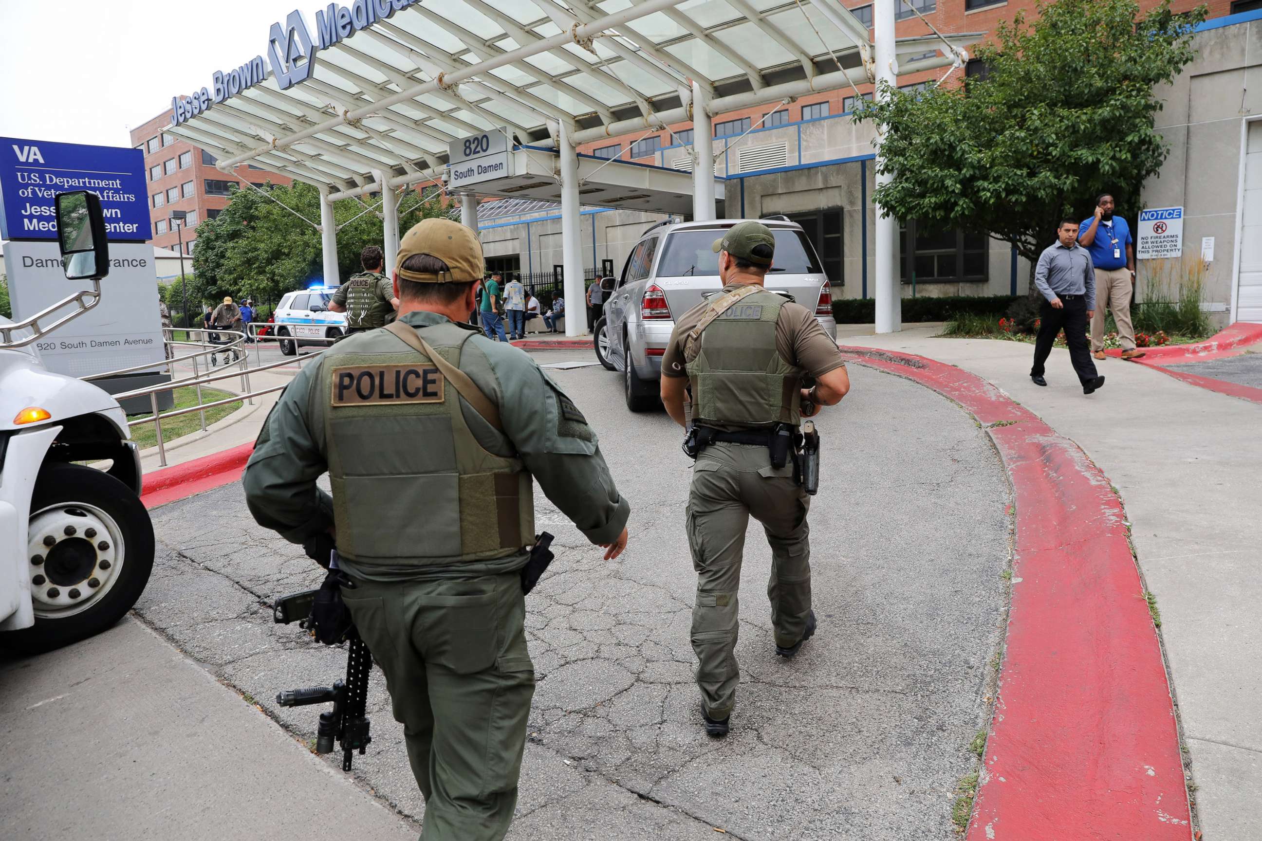 PHOTO: Police officers enter Jesse Brown VA Medical Center after reports of possible shots fired inside the hospital, Aug. 12, 2019 in Chicago.