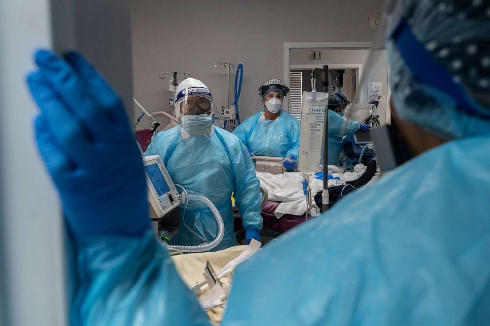 PHOTO: Medical staff members prepare for an intubation procedure on a patient suffering in the COVID-19 intensive care unit at the United Memorial Medical Center, Nov. 19, 2020, in Houston.