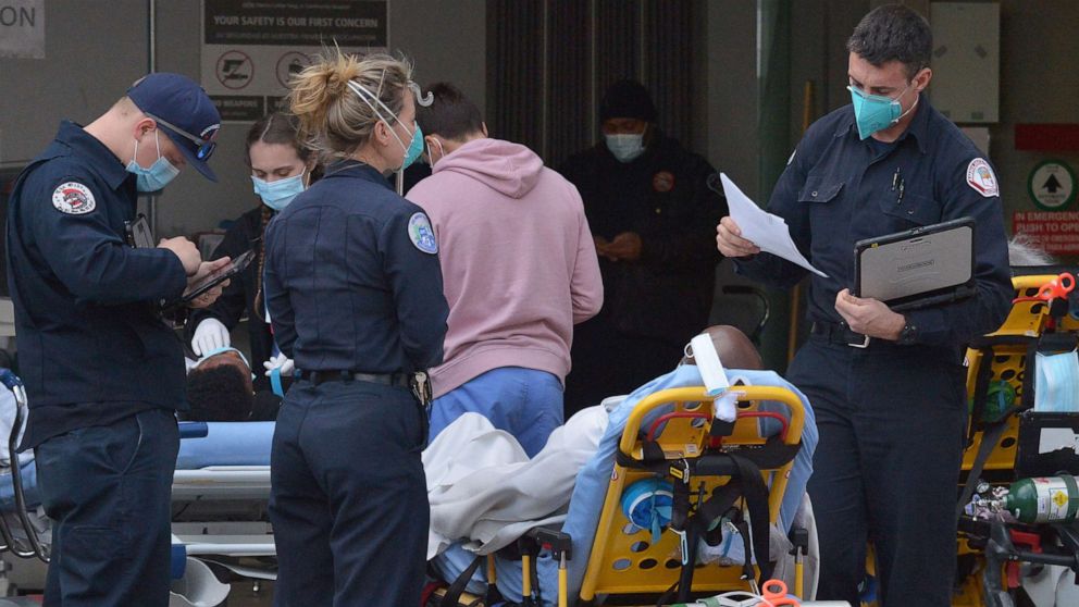 PHOTO: The Martin Luther King Hospital emergency entrance is a hub of activity on Jan. 27, 2021, in Los Angeles.