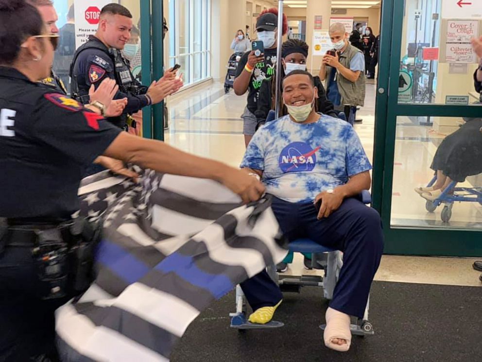 PHOTO: Harris County Constable Deputy Jaqaim Barthen is greeted upon his release from the hospital, Oct. 202, 2021,after being injured in an ambush shooting in Houston, Oct 16, 2021.
