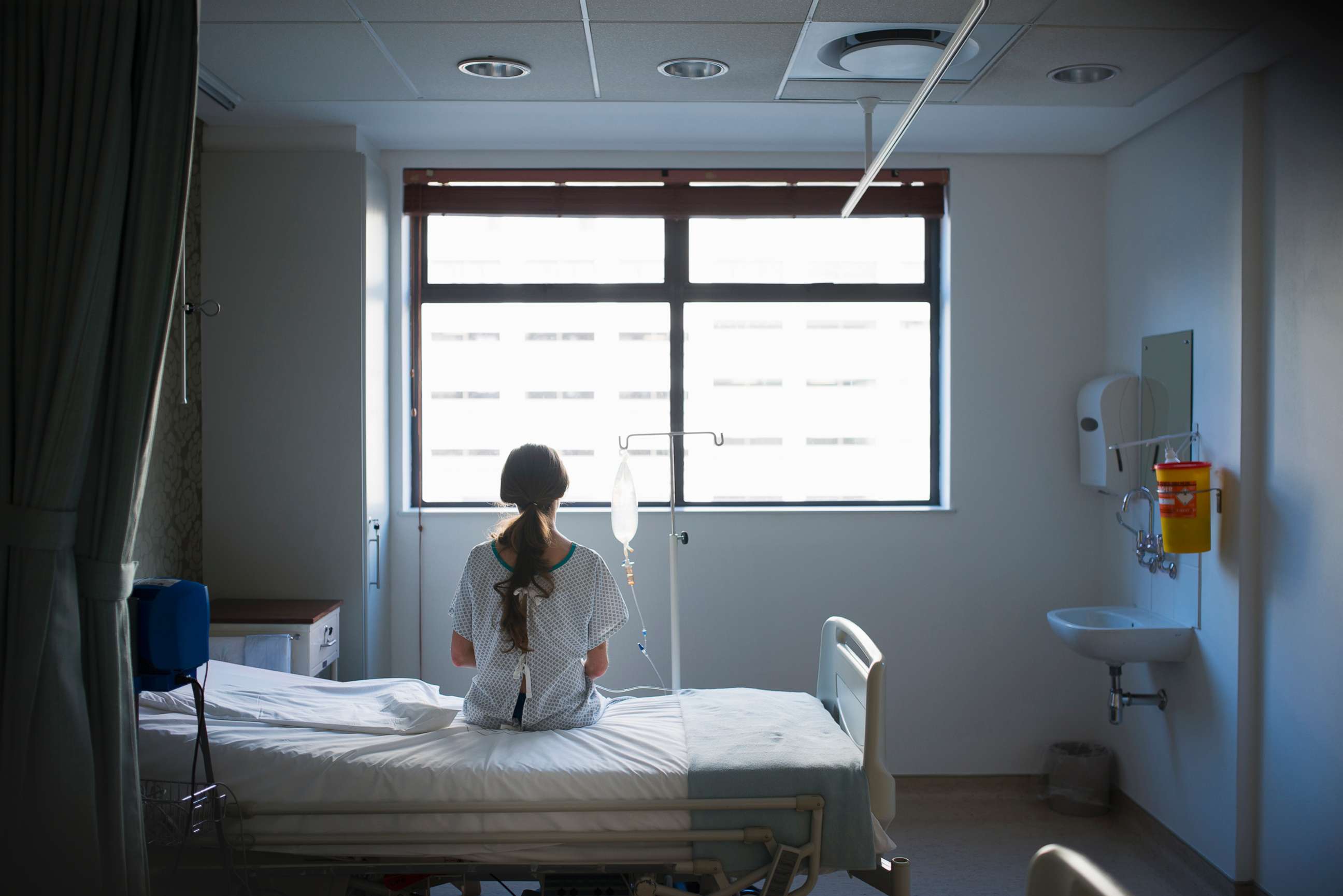 PHOTO: A patient sits on hospital bed in this undated stock photo.