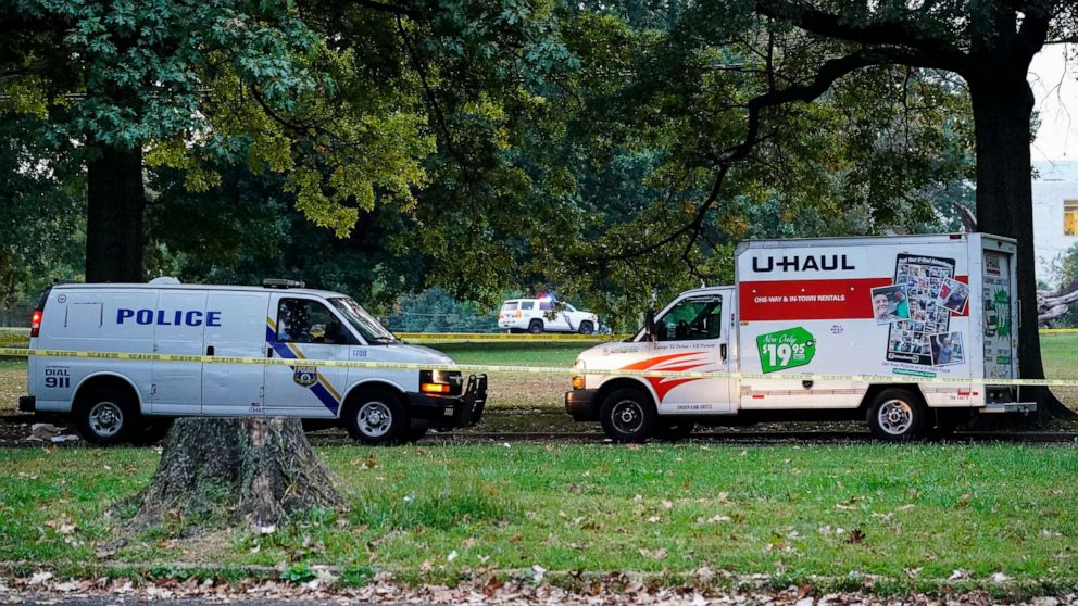 PHOTO: Police vehicles and a U-Haul truck are shown at a crime scene in Philadelphia, Oct. 4, 2021.