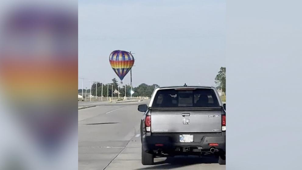 Hot air balloon strikes power lines, catches fire; 3 injured: FAA ...