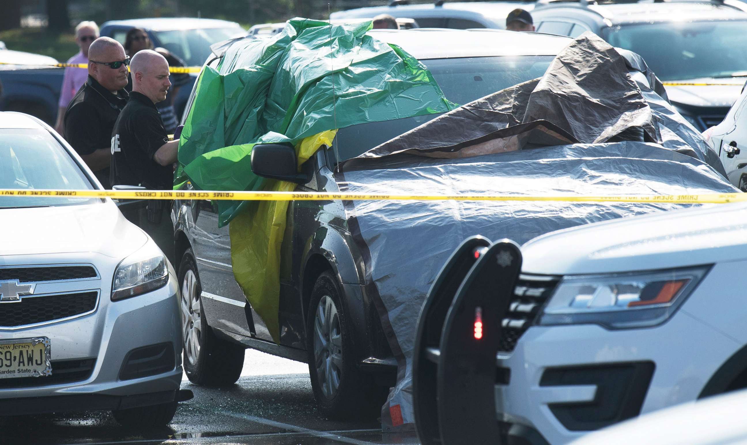 PHOTO: Authorities investigate the the death of a child found inside a vehicle in the parking lot of the PATCO Lindenwold Station, in Lindenwold, N.J., Aug. 16, 2019.  