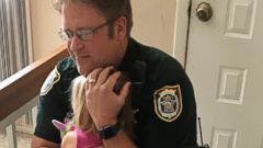 PHOTO: The Seminole County Sheriff’s Office posted a picture on its Facebook page of Deputy Bill Dunn reuniting with a 3 year old girl, who he rescued after she left in a hot car, after she made a full recovery.