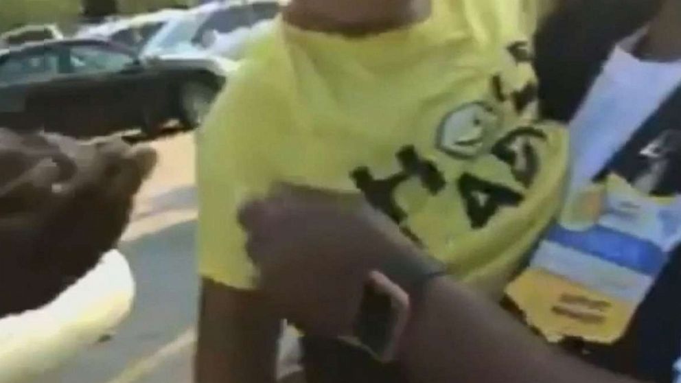 A 2-year-old boy was rescued from a scorching hot car in a Walmart parking lot in Georgia in a dramatic moment caught on video.