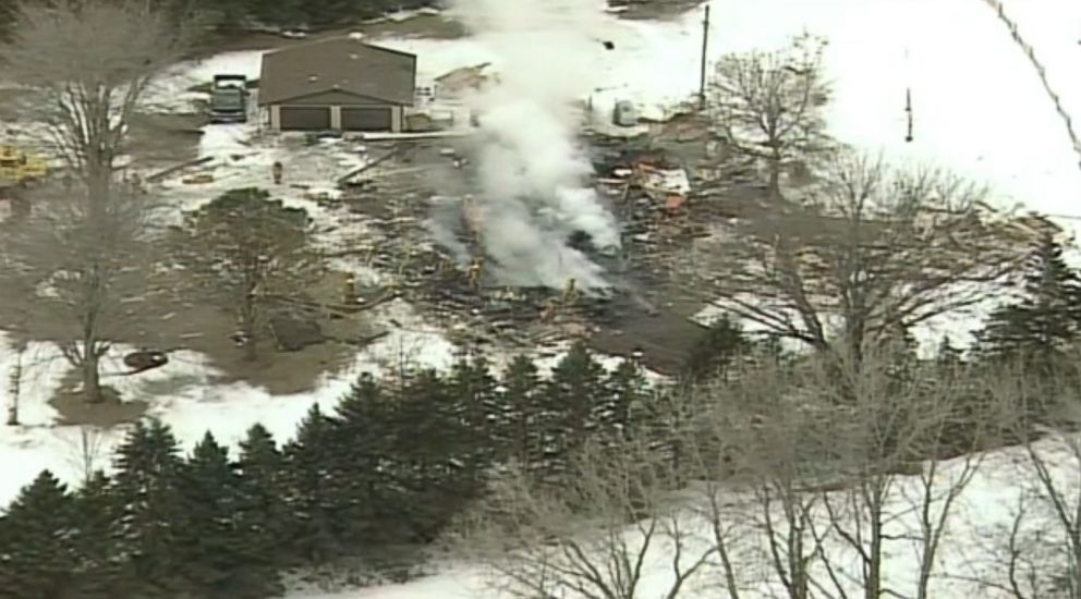 PHOTO: Firefighters are at the scene of a house fire following an explosion in Hampton, Minn., Feb. 5, 2019. 