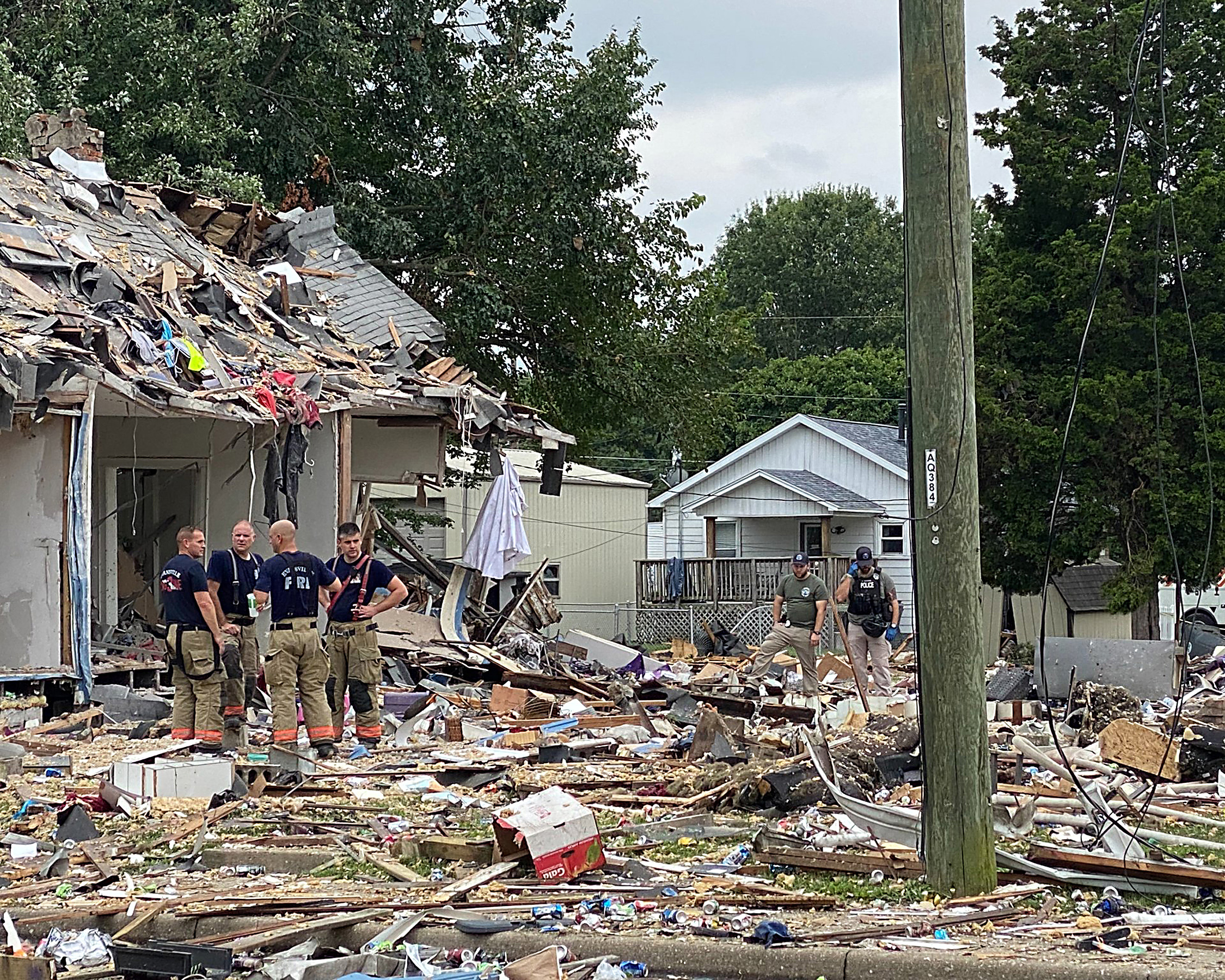 PHOTO:  The damage to the area where homes were damaged after a house explosion with multiple agencies on the scene on Aug. 10, 2022 in Evansville, Ind.