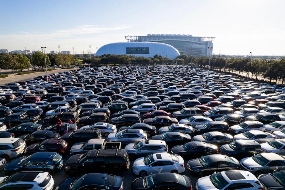 PHOTO: Houston residents line up in their cars for a special free food distribution by the Houston Food Bank at the NRG Stadium in Houston, Texas, on Nov. 1, 2025.