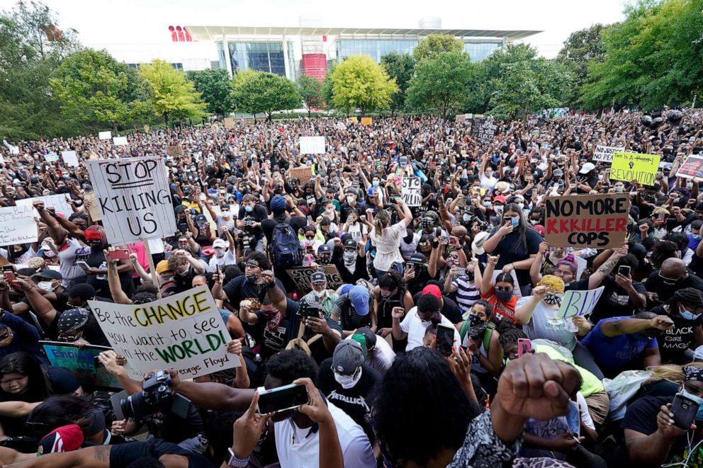 PHOTO: People march to protest the death of George Floyd in Houston, June 2, 2020.