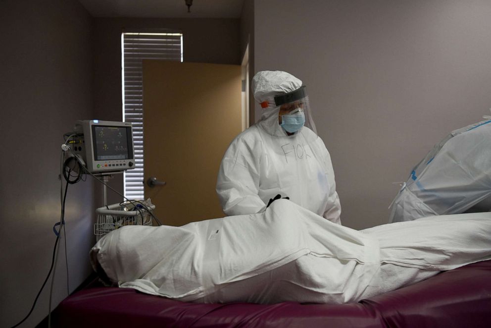 PHOTO: The body of a patient, who died during an intubation procedure, is prepared to be transported to a morgue, at United Memorial Medical Center (UMMC) in Houston, Texas, July 17, 2020.