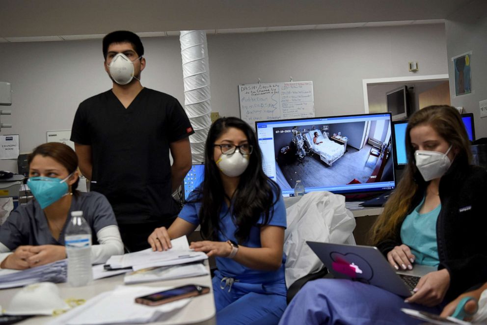 PHOTO: Live camera footage of a patient hospitalised with COVID-19 is shown from a computer monitor during a daily meeting lead by Dr. Joseph Varon at United Memorial Medical Center (UMMC) in Houston, Texas, July 10, 2020.