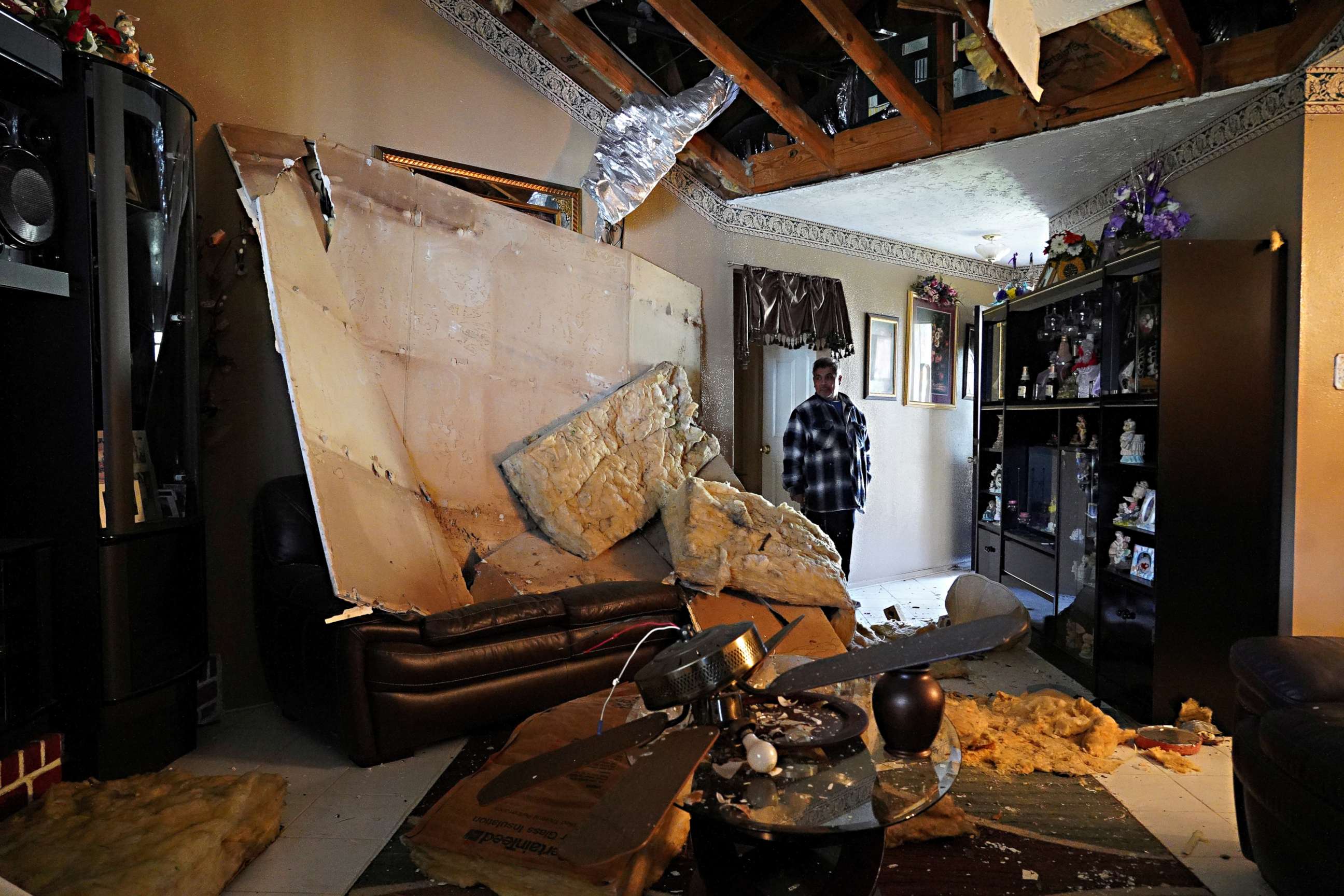 PHOTO: Fransisco Castrejon, 62, stands inside his house, damaged by a warehouse explosion in nearby Houston, January 24, 2020.