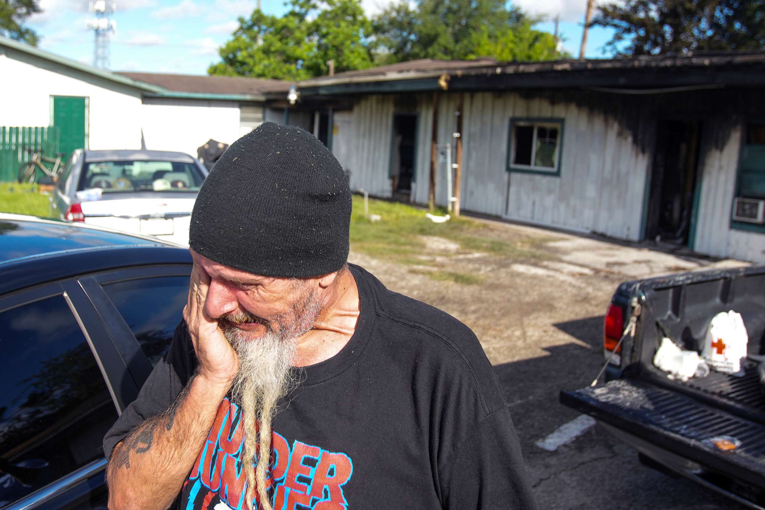 PHOTO: Robin Ahrens, a resident of a multi-room renting facility, reacts to a fatal shooting at the apartments in Houston, Aug. 28, 2022.