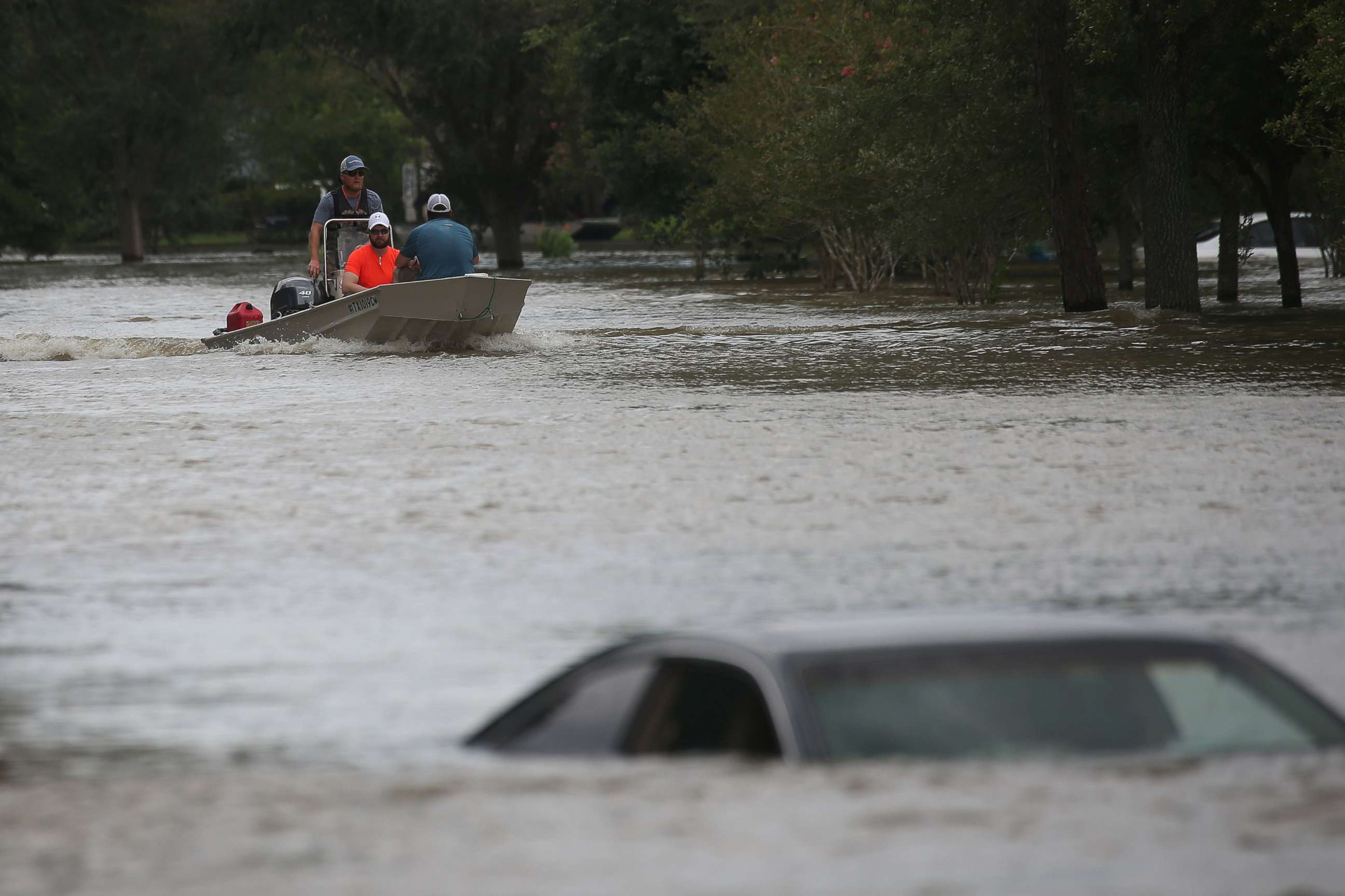 PHOTO: A rescue boat evacuates people from the rising waters of Buffalo Bayou following Hurricane Harvey in a neighborhood west of Houston, Texas, August 30, 2017.