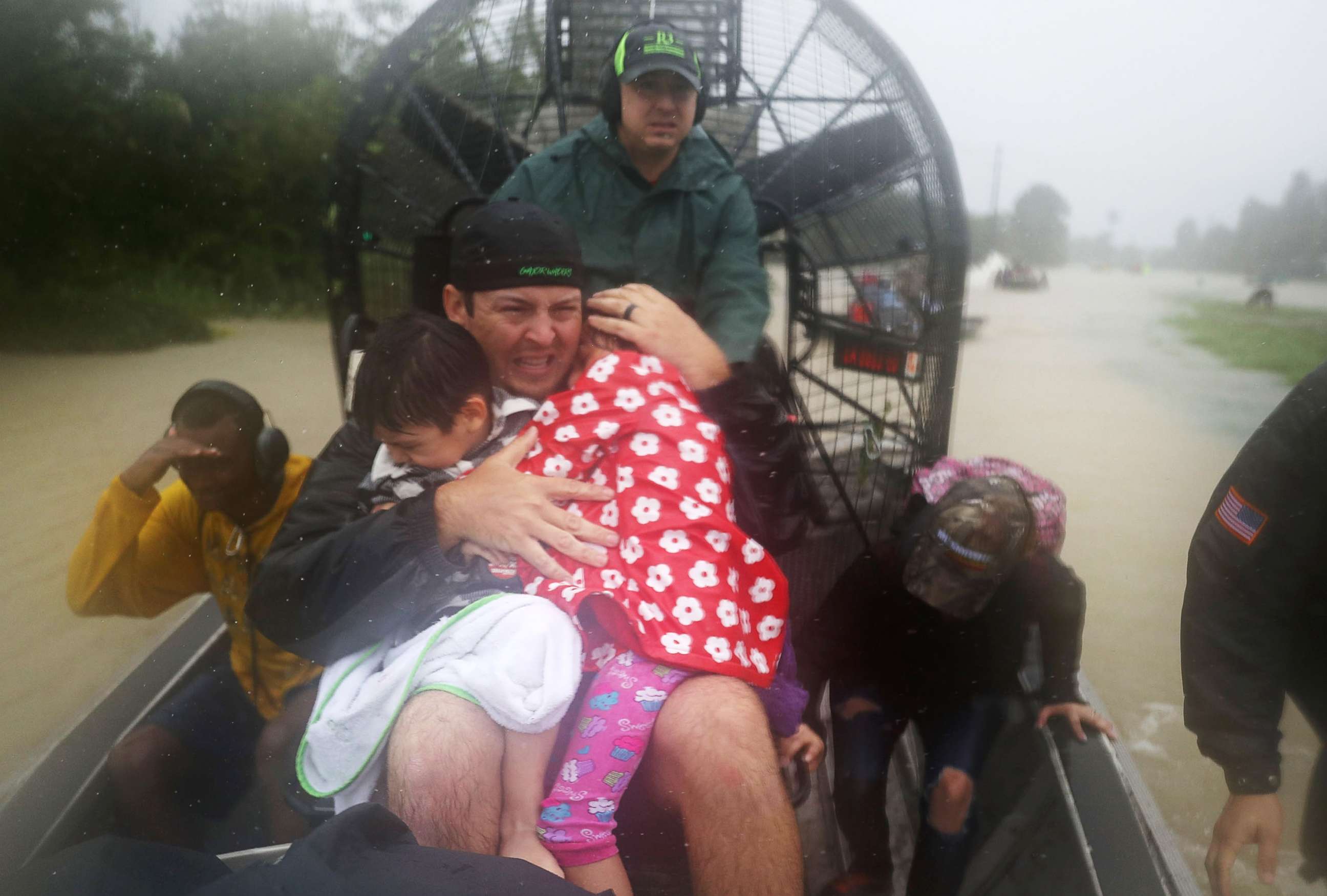 PHOTO: Rescuers use an airboat to rescue people from homes that are inundated with flooding from Hurricane Harvey on Aug. 28, 2017 in Houston.