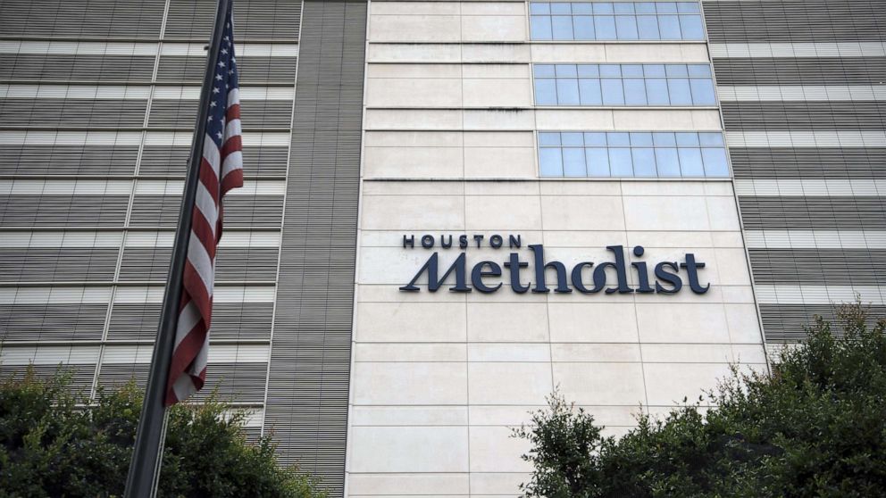 PHOTO: An American flag flies outside the Houston Methodist Hospital at the Texas Medical Center campus in Houston, June 24, 2020. 