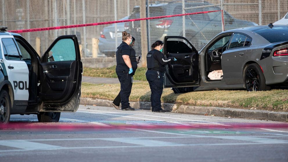 PHOTO: Police investigate the scene where three Houston Police Department officers were shot near the intersection of McGowen and Hutchins, on Jan. 27, 2022, in Houston.
