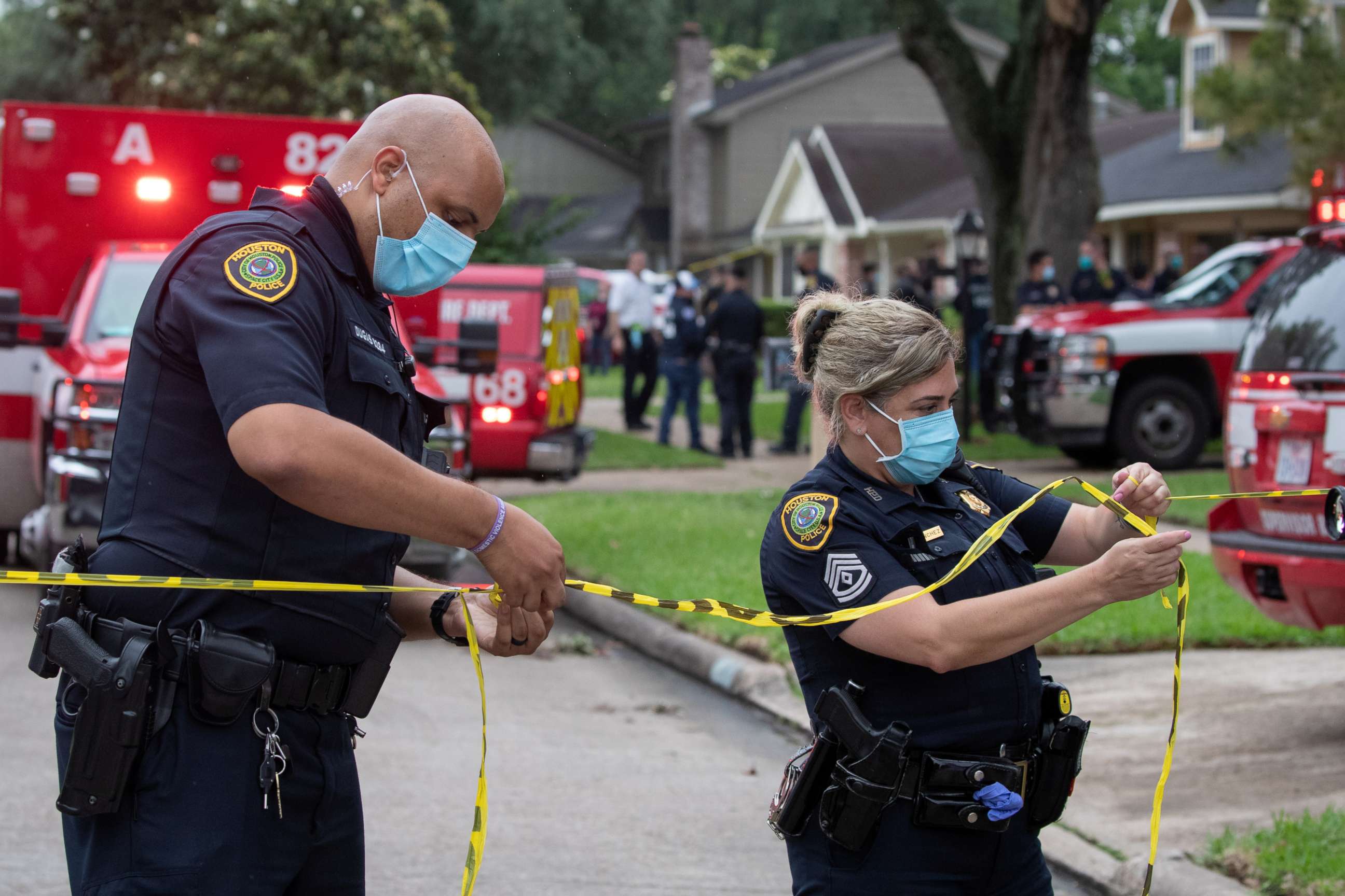 PHOTO: Police officials cordon off the street near 12200 Chessington Drive in southwest Houston, April 30, 2021.