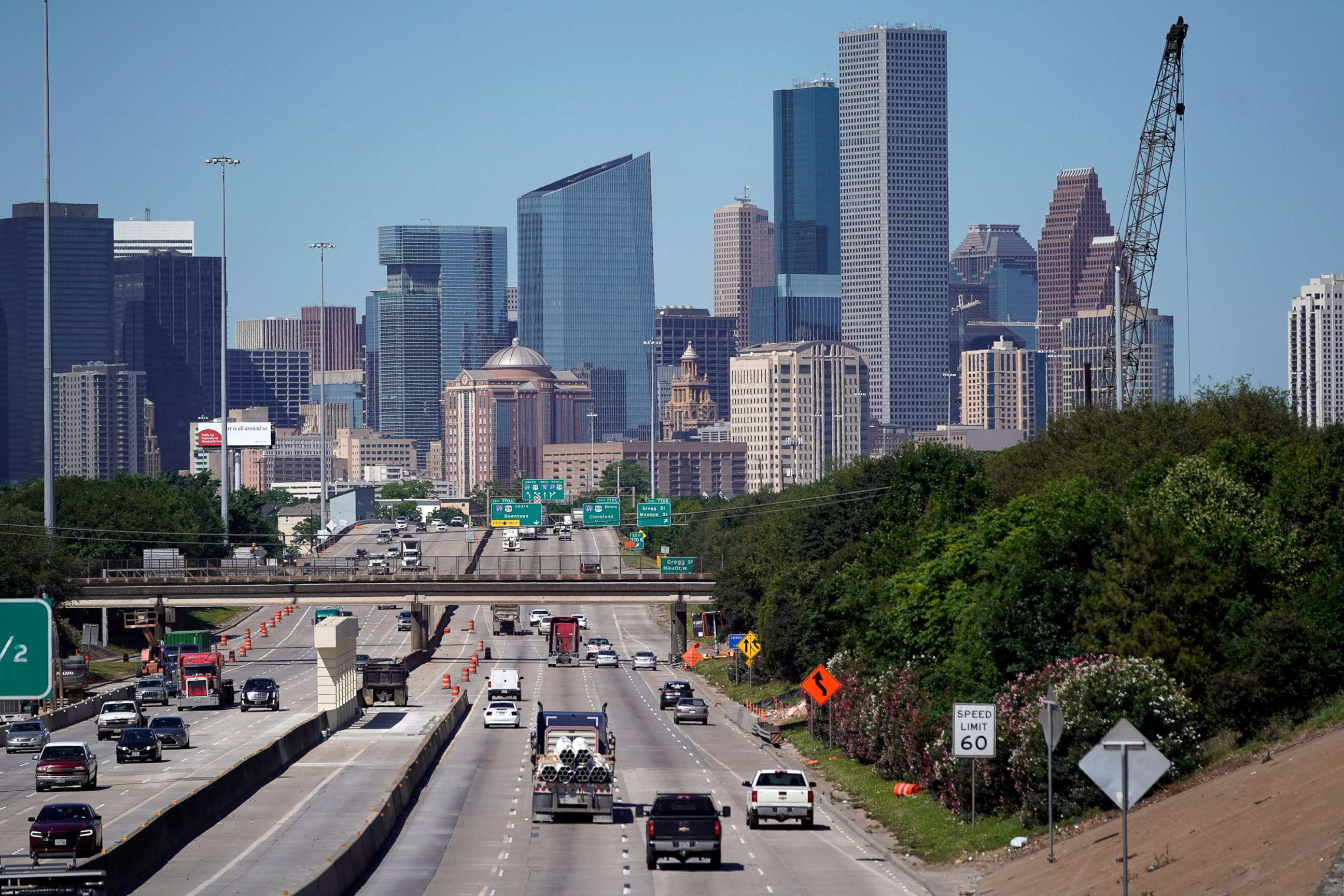 PHOTO: Traffic moves along Interstate 10, April 30, 2020, near downtown Houston during the coronavirus pandemic which shut down much of Houston's economic activity.
