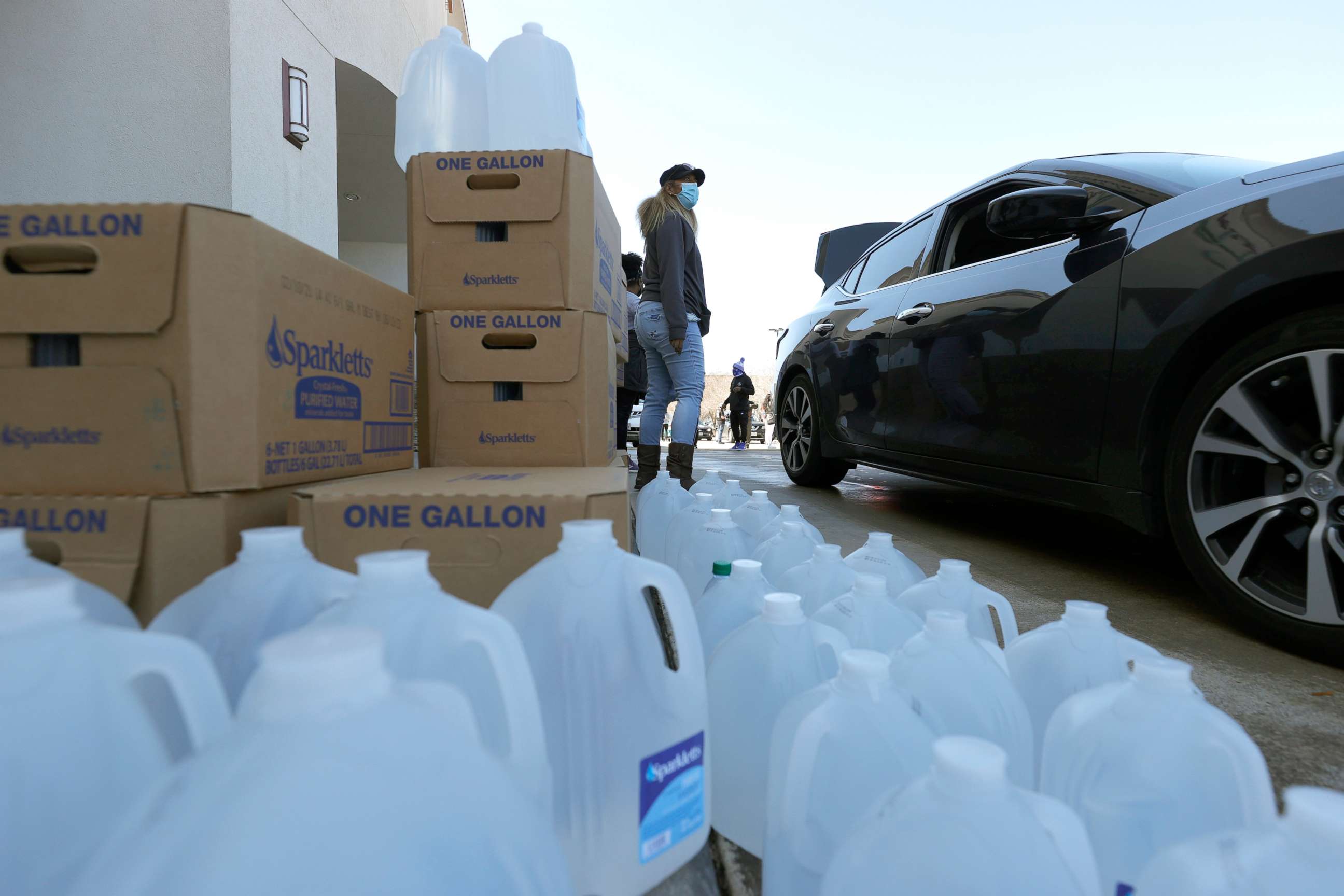 PHOTO: Volunteers prepare to hand out water during a water distribution event at the Fountain Life Center on Feb. 20, 2021 in Houston, Texas.