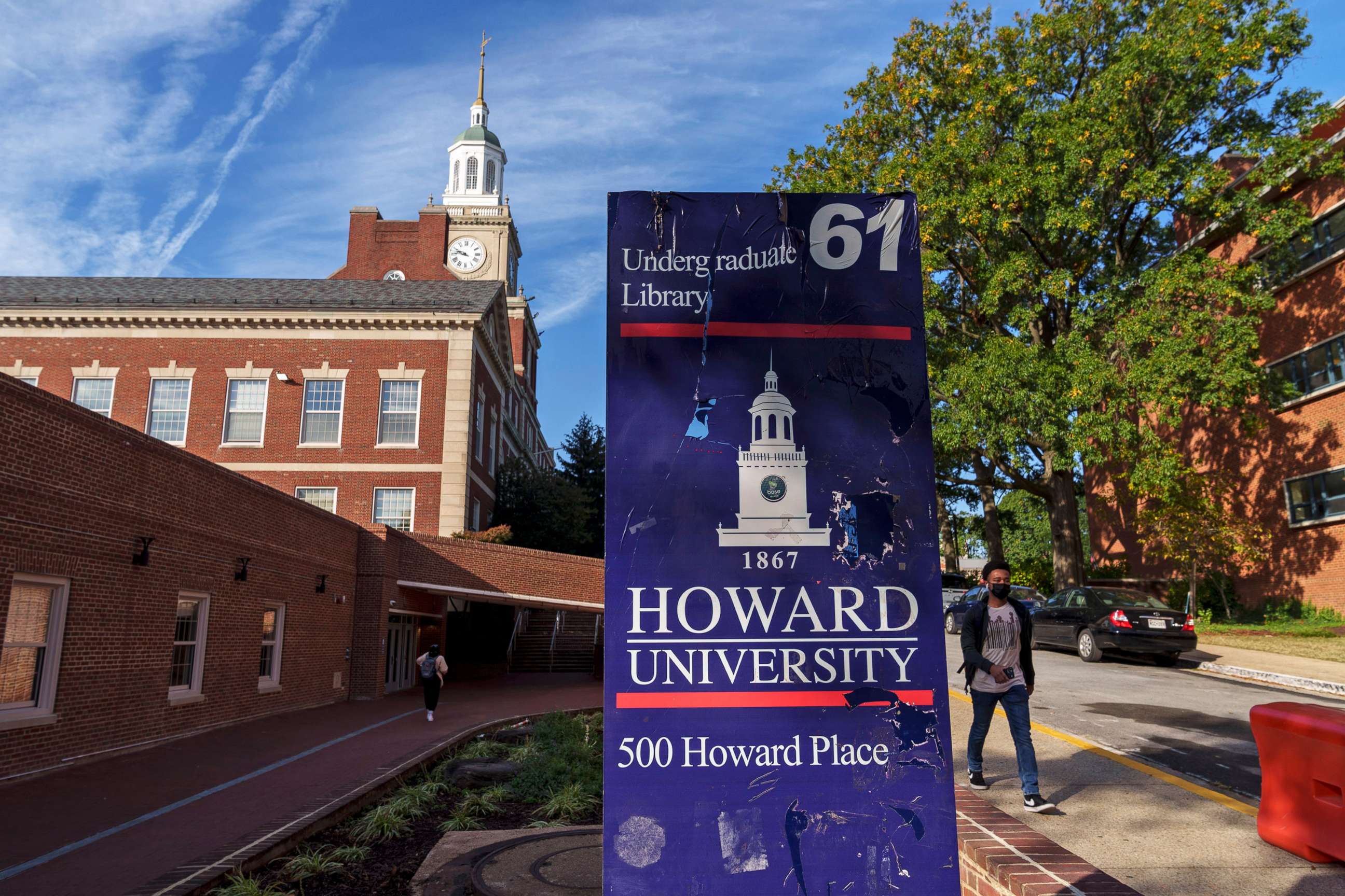 PHOTO: A student walks along the Howard University campus Oct. 25, 2021 in Washington, D.C.  