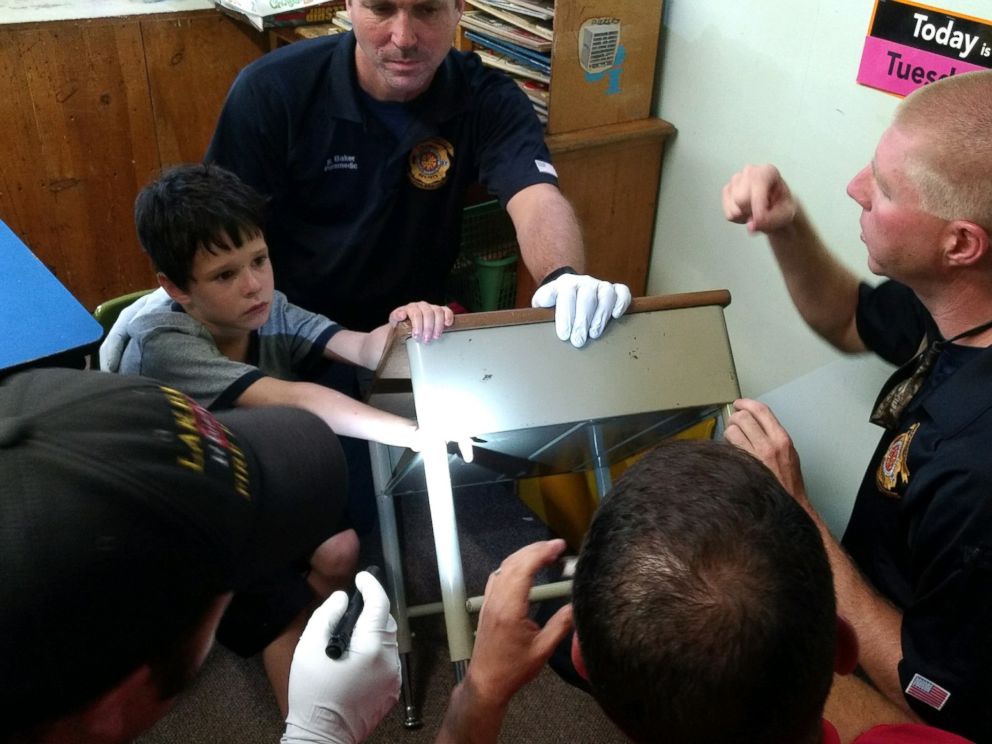 PHOTO: Lakeland Fire Department rescue crews worked patiently and kept Gio Aponte calm as they worked to free his finger from the desk, June 30, 2016.