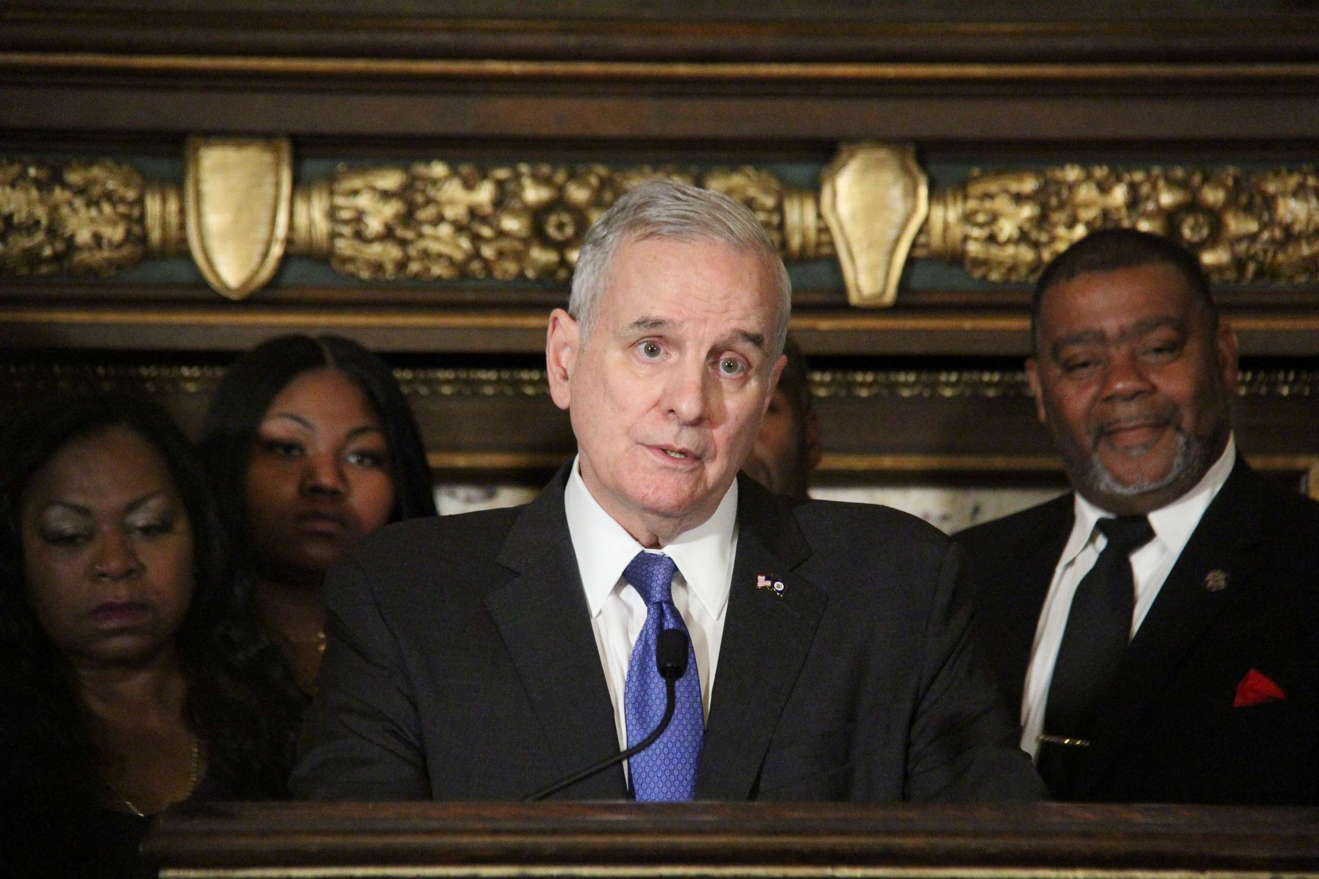 PHOTO: Minnesota Governor Mark Dayton, accompanied by family members of Philandro Castile, speaks on the anniversary of Castile's death in St. Paul, Minn., July 6, 2017.