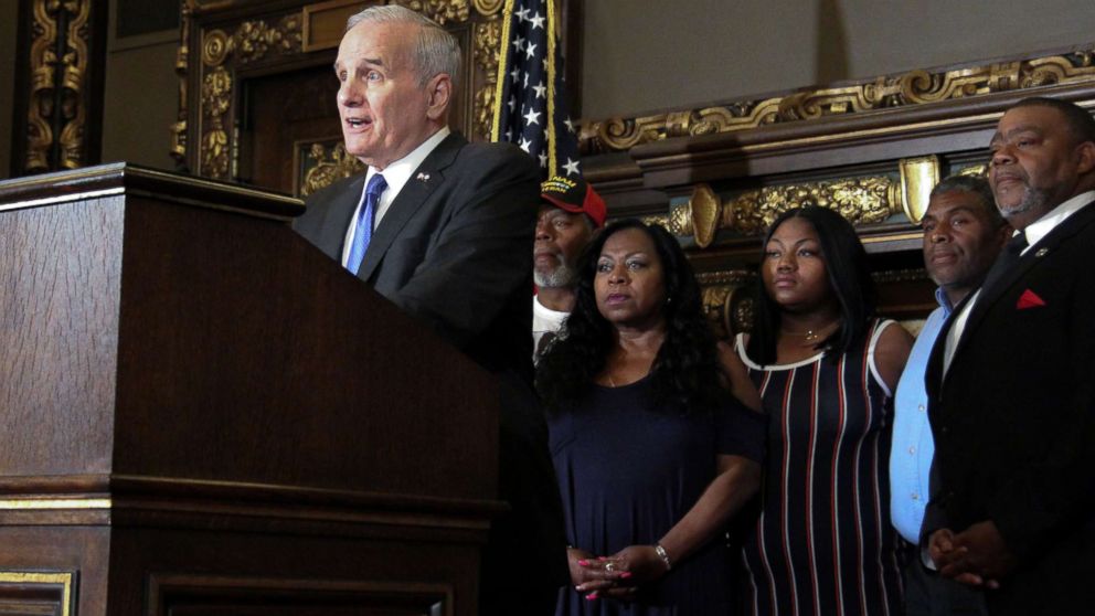 PHOTO: Minnesota Governor Mark Dayton, accompanied by family members of Philandro Castile, speaks on the anniversary of Castile's death in St. Paul, Minn., July 6, 2017.