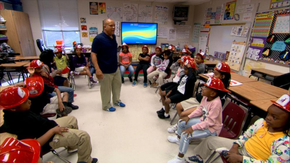 PHOTO: Ralph Heard returned to his former elementary school to teach students about fire safety. The Hartford Junior Fire Marshall Program, which trained Heard when he was 9, is celebrating its 70th anniversary.