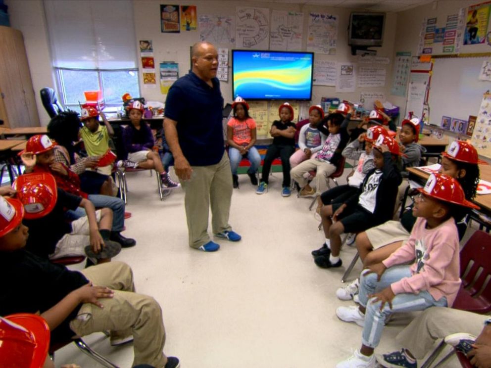 PHOTO: Ralph Heard returned to his former elementary school to teach students about fire safety. The Hartford Junior Fire Marshall Program, which trained Heard when he was 9, is celebrating its 70th anniversary.