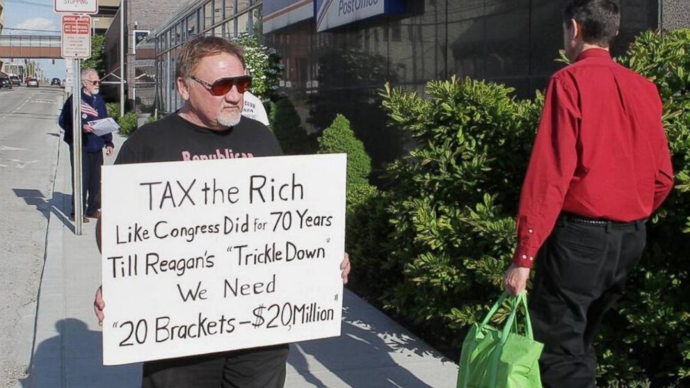 James Hodgkinson of Belleville protests outside of the United States Post Office in  Belleville, Ill., in this file photo. Hodgkinson is part of the "99%"?? team drawing attention to the disproportionate amount of money and political power the top 1 percent of Americans have acquired. 