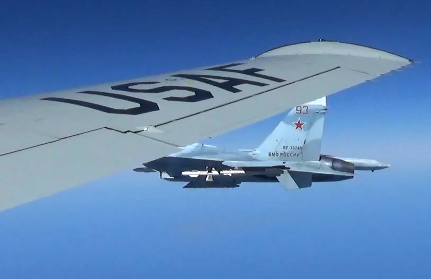PHOTO: A Russian SU-27 Flanker fighter flies as close as five feet from a RC-135 U.S. Air Force reconnaissance aircraft which was flying in international airspace over the Baltic Sea, June 19, 2017. 