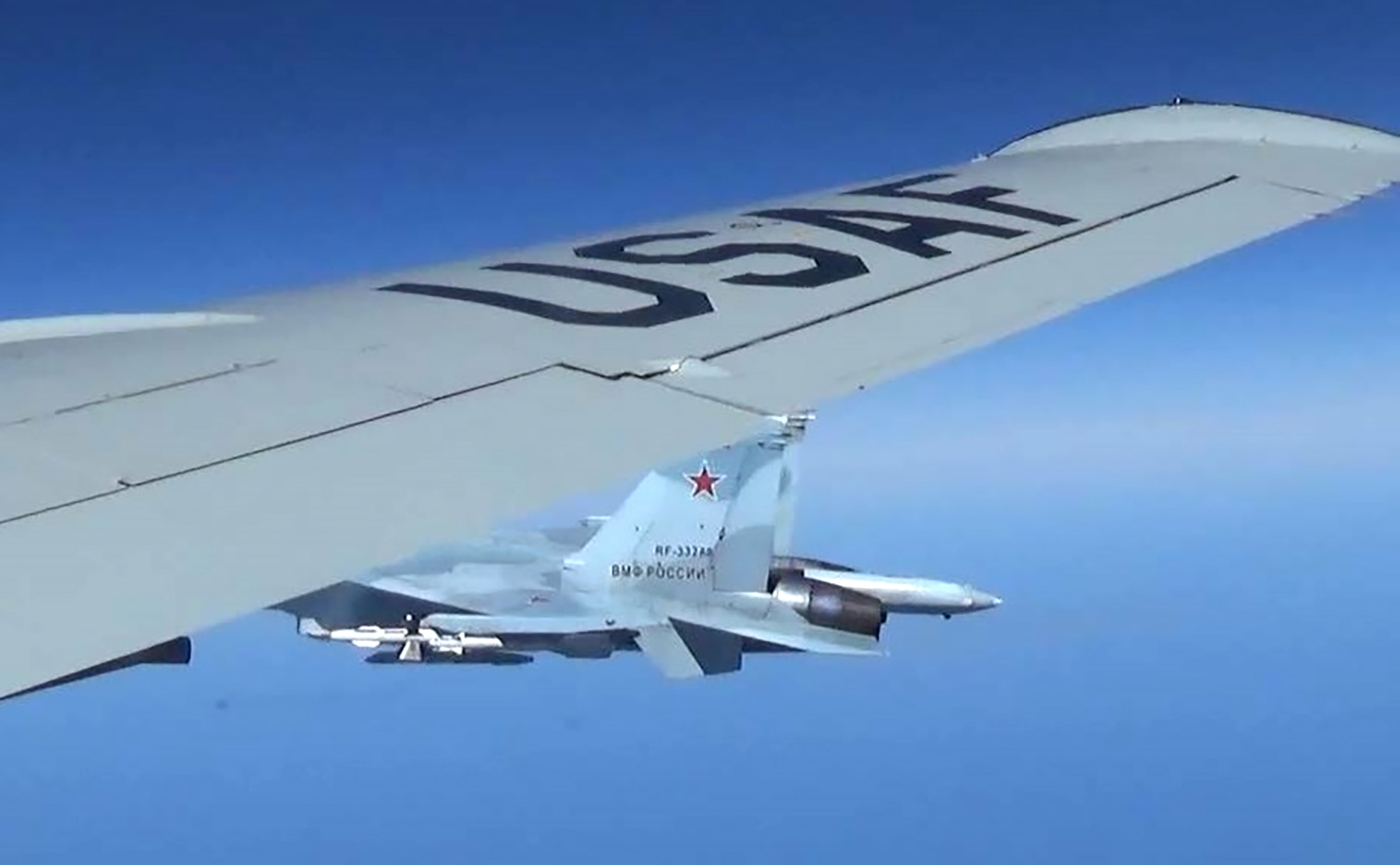 PHOTO: A Russian SU-27 Flanker fighter flies as close as five feet from a RC-135 U.S. Air Force reconnaissance aircraft which was flying in international airspace over the Baltic Sea, June 19, 2017. 