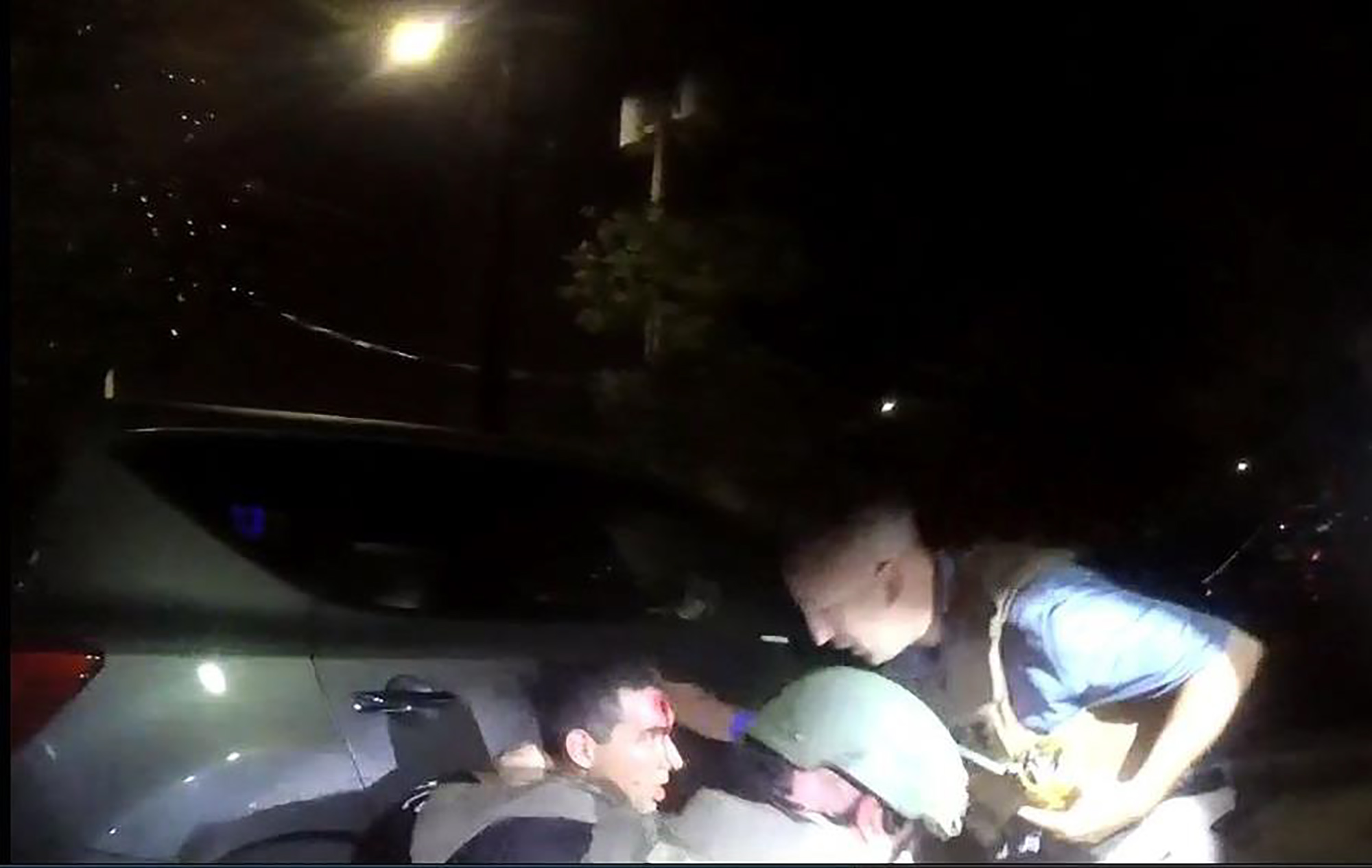 PHOTO: An image released by the Orlando Police shows a SWAT officer receiving treatment after he was struck in the head by gunfire while responding to the shooting at the Pulse Nightclub on June 12, 2016 in Orlando, Fla.