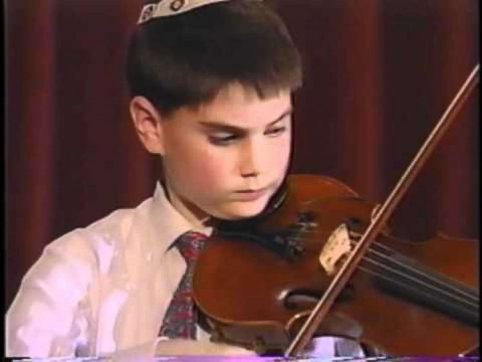 Ben Shapiro is seen here playing the violin as a child in this undated family photo. 